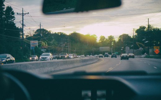 View out of a car windscreen. Mad in the back?